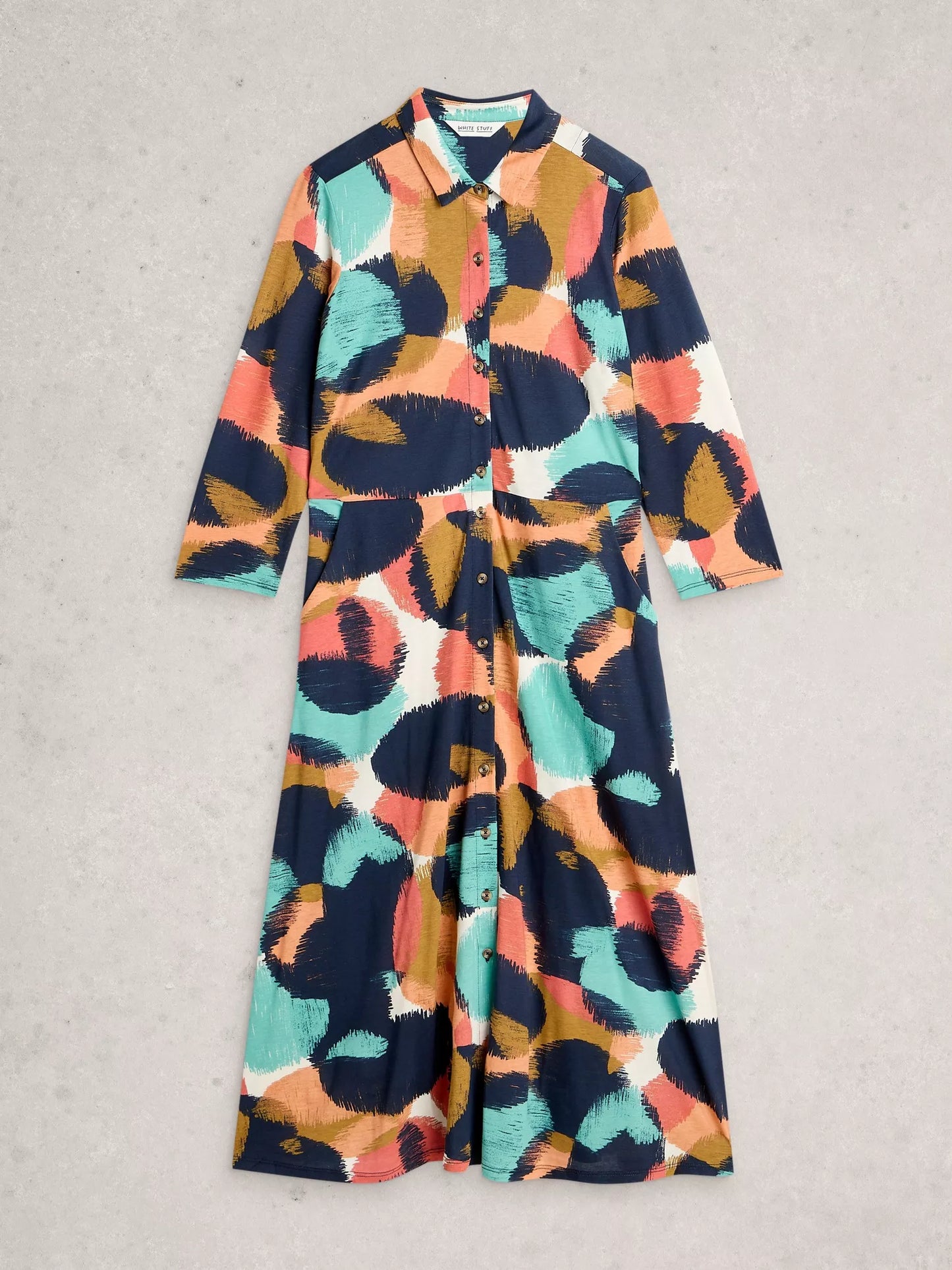 Flat lay of multi coloured shirt dress