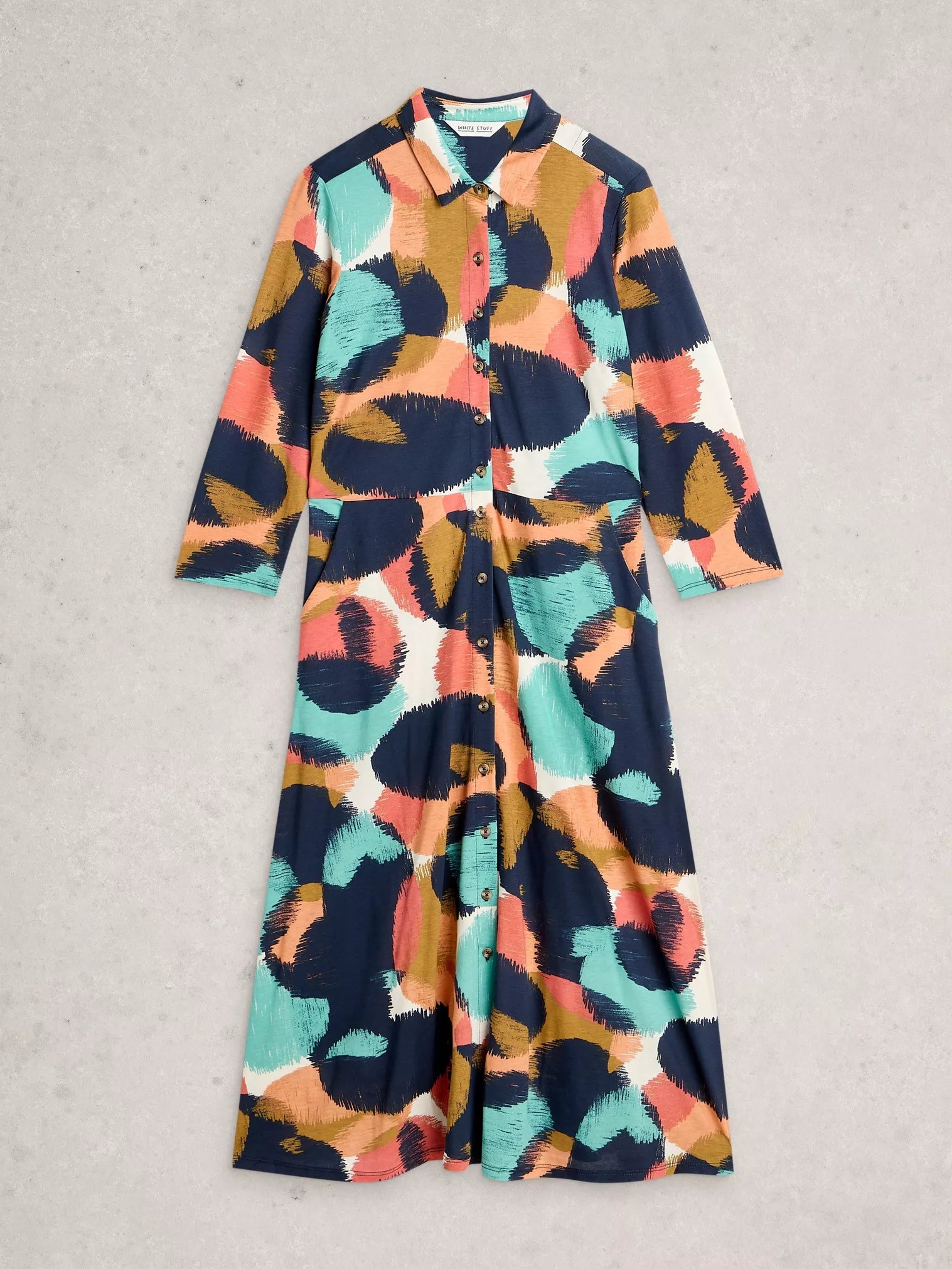 Flat lay of multi coloured shirt dress