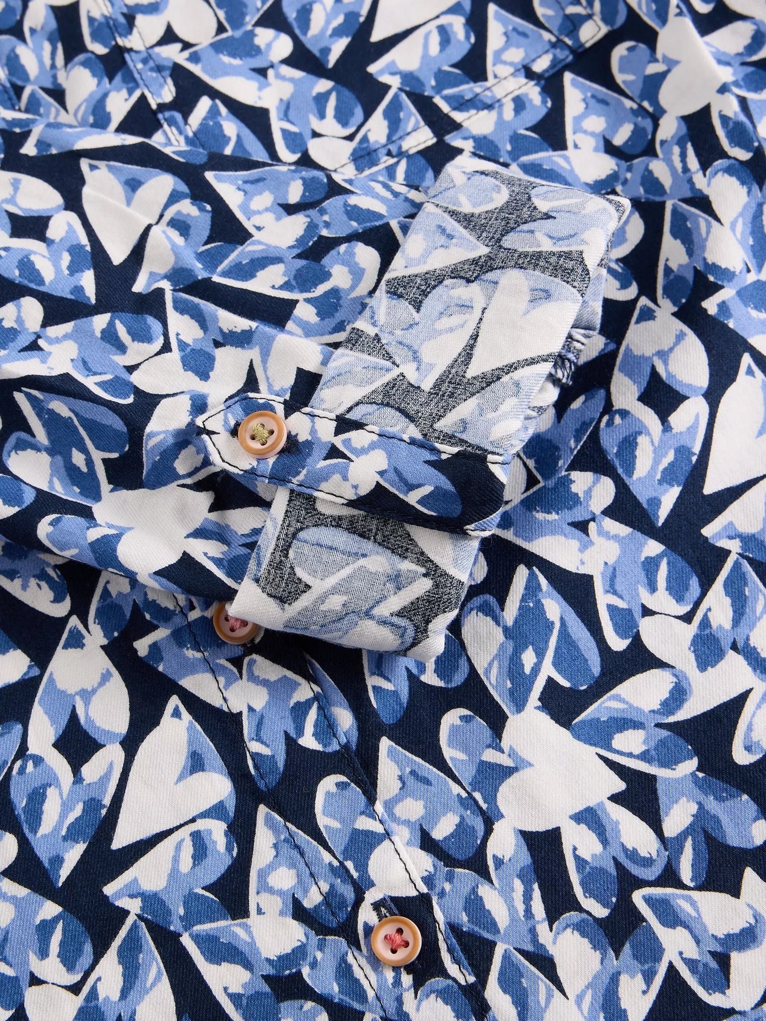 Close up of navy blue heart print