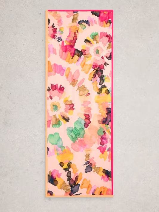 Pink scarf with colourful floral pattern on a light grey background