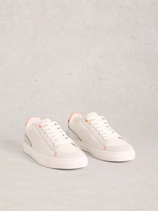 White sneakers on a light gray background