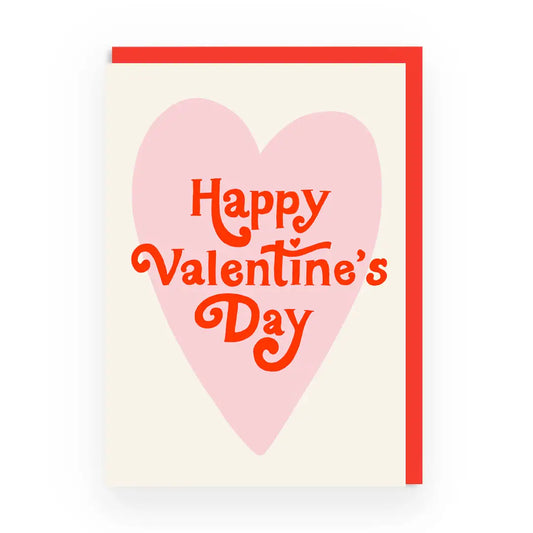 A greeting card with a large pink heart background and red border. The text 'Happy Valentine's Day' is written in a flowing orange script inside the heart.