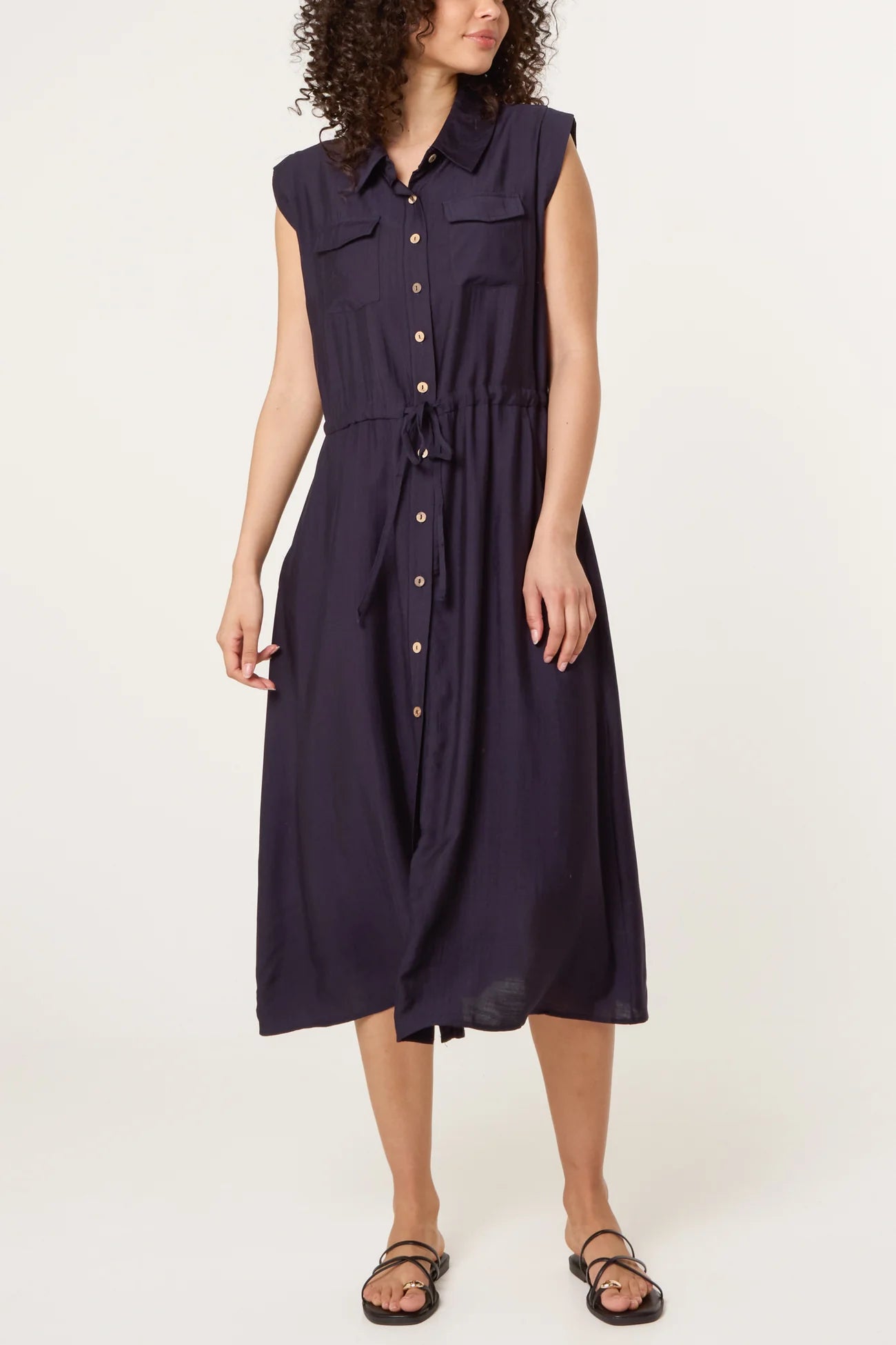 model wearing navy shirt dress